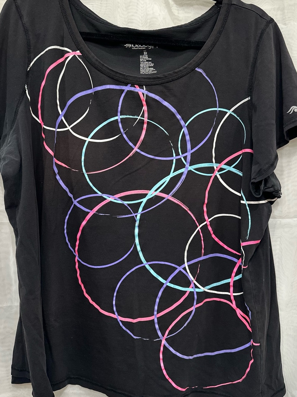 Ideology Athleisure | Black Scoop Neck Tee with Multicolor Ring Graphic